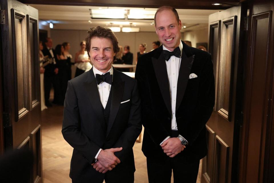 PHOTO: Prince William poses for a photo with Tom Cruise at the London Air Ambulance Charity Gala Dinner in London, Feb. 7, 2024.  (Daniel Leal/POOL/AFP via Getty Images)