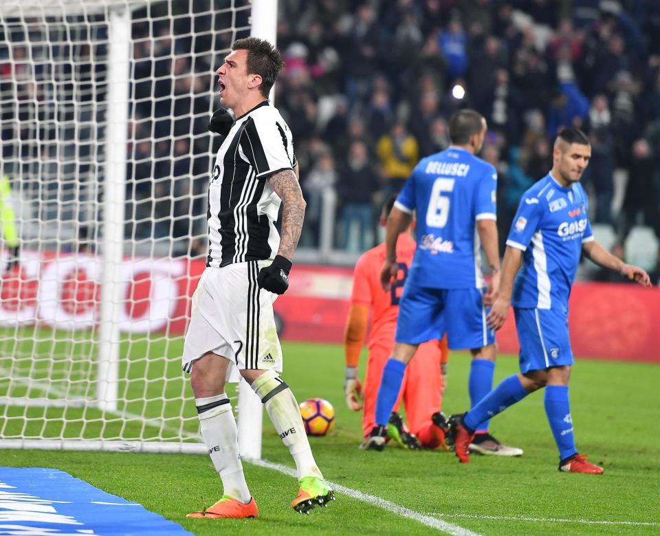 Juventus' Mario Mandzukic celebrates a goal during the Italian Serie A soccer match between Juventus and Empoli at the Juventus stadium in Turin, Italy, Saturday, Feb. 25 2017. (Alessandro Di Marco/ANSA via AP)