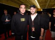 <p>Ariana’s manager Scooter Braun gave an empowered speech on stage at the One Love concert and chatted to Robbie Williams backstage, after he held back tears singing ‘Angels’ to the 60,000 strong crowd. (Getty) </p>