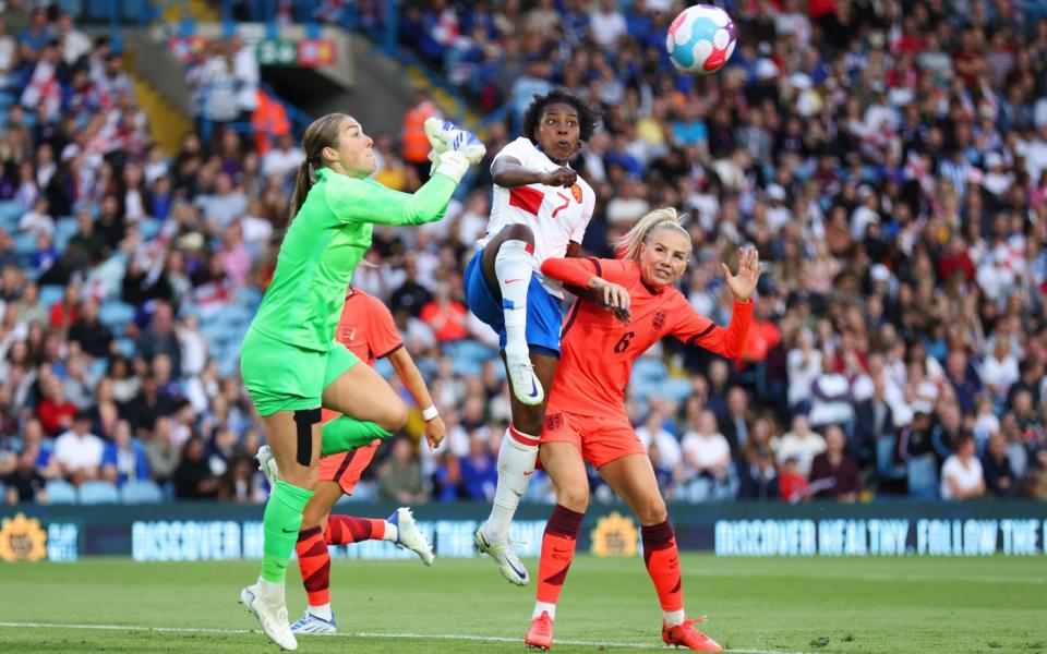 Mary Earps of England contends for the aerial ball with Lineth Beerensteyn - Getty Images