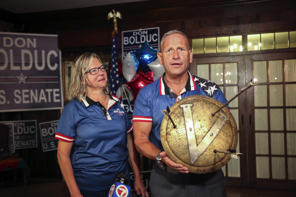 New Hampshire Republican U.S. Senate candidate Don Bolduc and his wife Sharon attend a primary night campaign gathering, Tuesday Sept. 13, 2022, in Hampton, N.H. (AP Photo/Reba Saldanha)