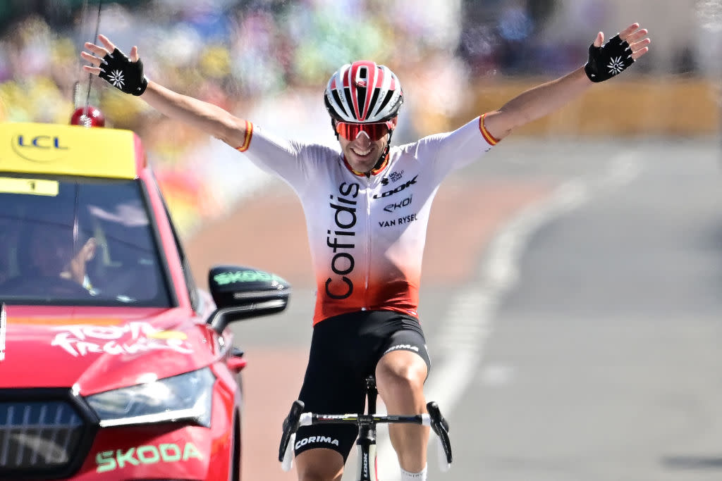  Cofidis' Spanish rider Ion Izaguirre Insausti cycles to the finish line to win the 12th stage of the 110th edition of the Tour de France cycling race, 169 km between Roanne and Belleville-en-Beaujolais, in central-eastern France, on July 13, 2023. (Photo by Marco BERTORELLO / AFP) 