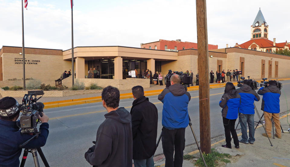 A small but growing line of trial spectators, watched by television crews, wait to enter the Erath County, Donald R. Jones Justice Center in Stephenville, Texas, Friday, Feb. 13, 2015 for the capital murder trial of former Marine Cpl. Eddie Ray Routh. Routh is charged with the 2013 deaths of former Navy SEAL Chris Kyle and his friend Chad Littlefield at a shooting range near Glen Rose,Texas. (Paul Moseley/Fort Worth Star-Telegram/TNS via Getty Images)