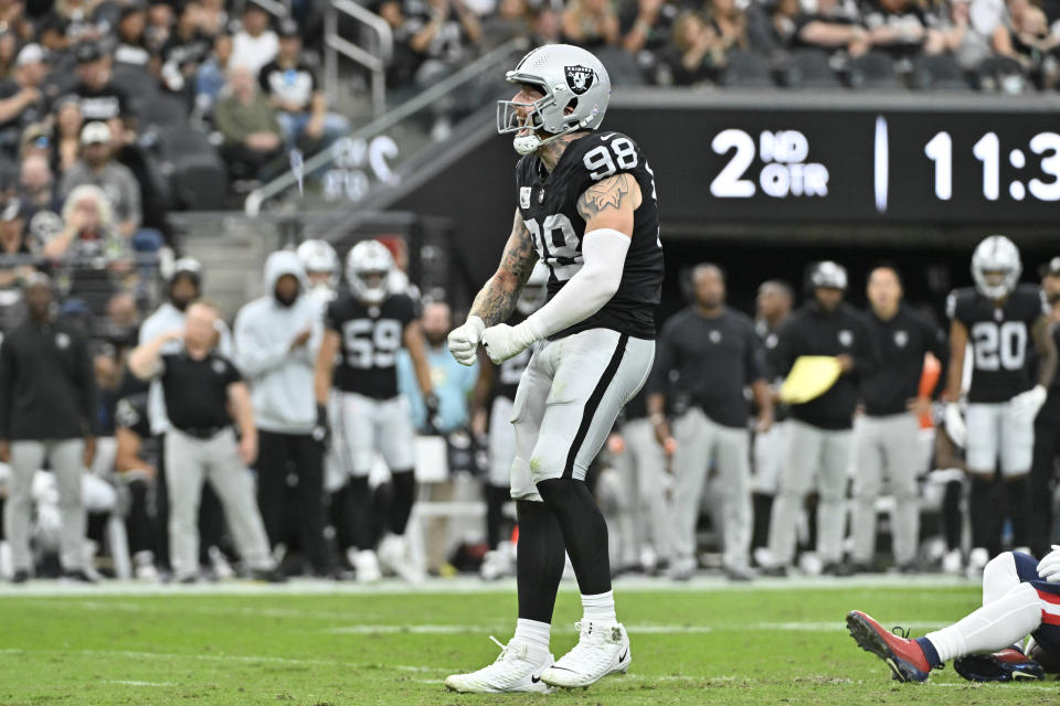 Las Vegas Raiders defensive end Maxx Crosby reacts after a tackle during the first half of an NFL football game against the New England Patriots, Sunday, Oct. 15, 2023, in Las Vegas. (AP Photo/David Becker)