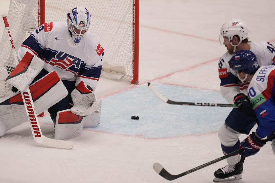 Slovakia's Simon Nemec scores his side's third goal during the preliminary round match between United States and Slovakia at the Ice Hockey World Championships in Ostrava, Czech Republic, Monday, May 13, 2024. (AP Photo/Darko Vojinovic)