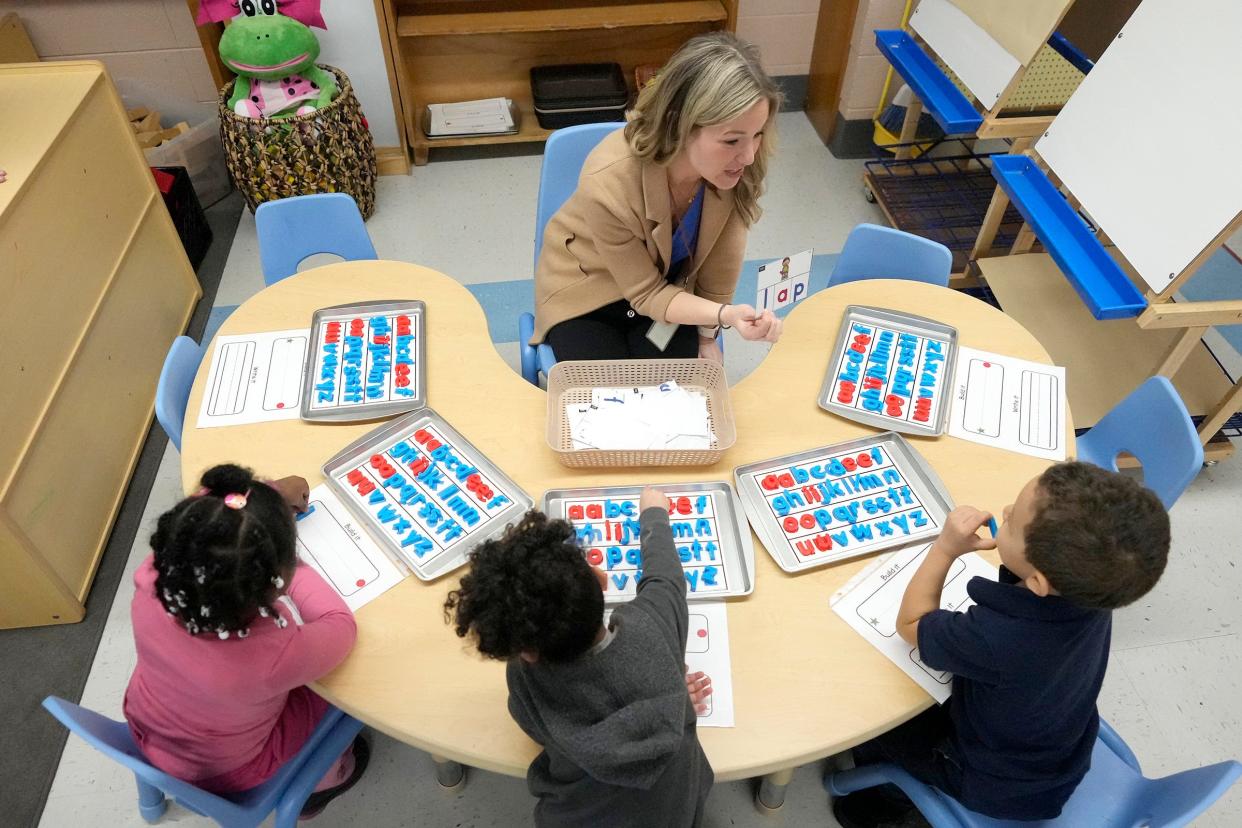 Hawthorne School K-4 teacher Jessica Kovacovich works with students on a reading and spelling lesson at the school on North 41st Street in Milwaukee on Feb. 22.