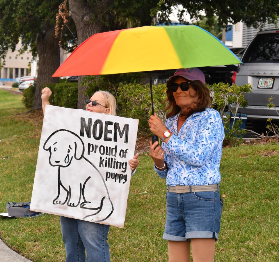 South Dakota Governor Kristi Noem, considered to be contender for Donald Trump’s running mate, was the guest speaker at the Radisson at the Port Saturday evening for a Republican event. Across the street, a small, dedicated group of protesters gathered in the rain and lightning. The group was protesting having her as a speaker after she claimed in her book that she killed her dog Cricket.