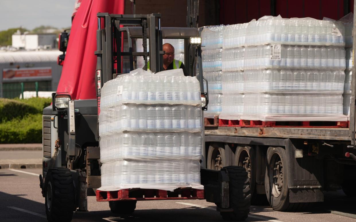 Water is delivered to an Asda supermarket
