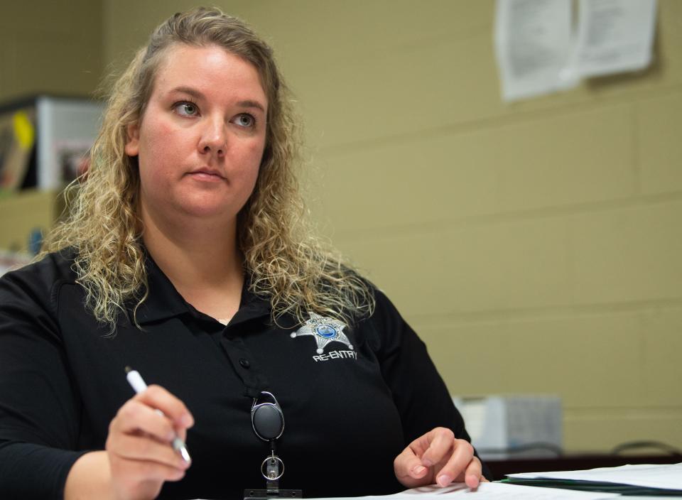 Alicia Shadwick assists Sheriff Clint Shrum while interviewing inmates participating in the CAREERRS program at the Grundy County Detention Center in Altamont, Tenn., Wednesday, Dec. 1, 2021.