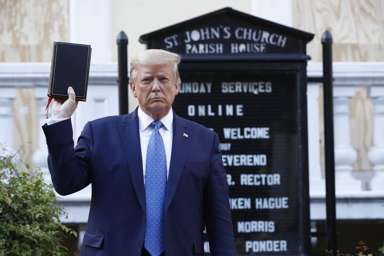 President Donald Trump holds a Bible outside St. John's Church across Lafayette Park from the White House on June 1, 2020. (Photo: ASSOCIATED PRESS)
