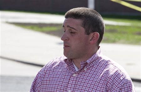 Ed Kovac, the cousin of slain student Maren Sanchez, addresses the media in front of Jonathan Law High School in Milford, Connecticut April 25, 2014. REUTERS/Michelle McLoughlin