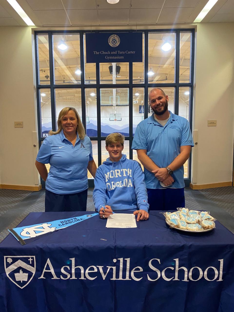 Asheville School swimmer Patrick Sleater signs with UNC on Nov. 10, 2021.