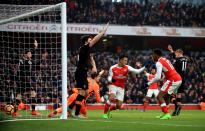 <p>Alexis Sanchez celebrates putting Arsenal ahead</p>