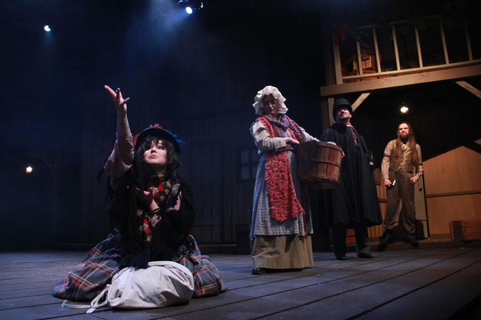 The cast of "A Territorial Christmas Carol" performs a 2022 show at Guthrie's Pollard Theatre.