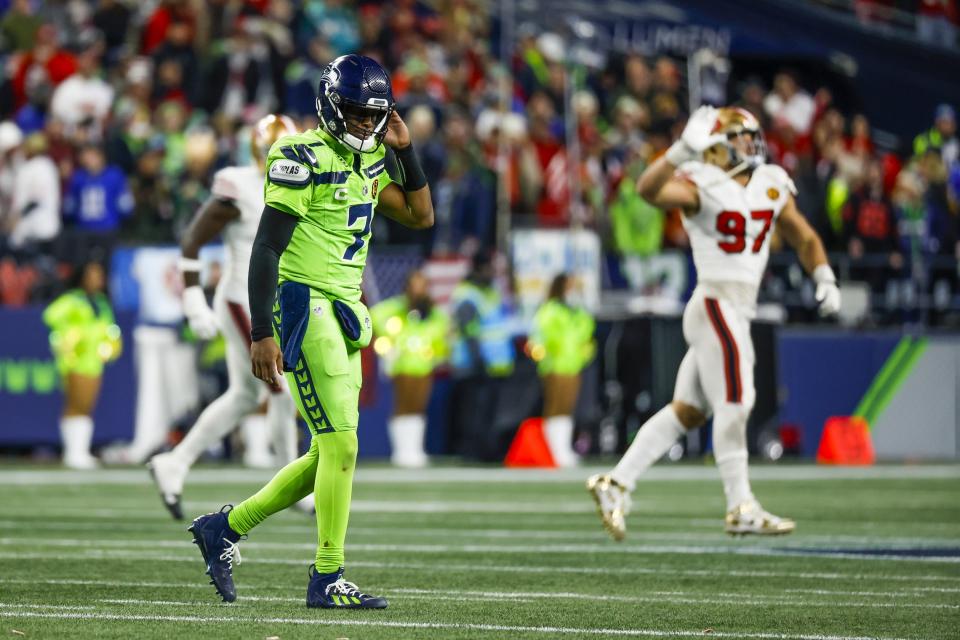 Nov 23, 2023; Seattle, Washington, USA; Seattle Seahawks quarterback <a class="link " href="https://sports.yahoo.com/nfl/players/26662" data-i13n="sec:content-canvas;subsec:anchor_text;elm:context_link" data-ylk="slk:Geno Smith;sec:content-canvas;subsec:anchor_text;elm:context_link;itc:0">Geno Smith</a> (7) reacts following a failed third down conversion against the San Francisco 49ers during the fourth quarter at Lumen Field. Mandatory Credit: Joe Nicholson-USA TODAY Sports
