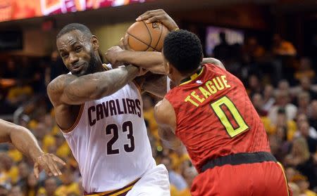 May 4, 2016; Cleveland, OH, USA; Cleveland Cavaliers forward LeBron James (23) is fouled by Atlanta Hawks guard Jeff Teague (0) during the second quarter in game two of the second round of the NBA Playoffs at Quicken Loans Arena. Mandatory Credit: Ken Blaze-USA TODAY Sports