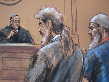 Suleiman Abu Ghaith (R) stands with his attorney Stanley Cohen (C) in front of U.S. District Judge Lewis Kaplan during his sentencing on terrorism charges, as seen in this courtroom drawing in New York September 23, 2014. REUTERS/Jane Rosenberg