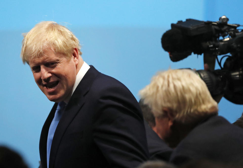 British lawmaker Boris Johnson arrives for the announcement of the new leader of the Conservative Party will be made in London, Tuesday, July 23, 2019. Britain's governing Conservative Party is set to reveal Tuesday the identity of the country's next prime minister, with Brexit hardliner Boris Johnson the strong favorite to get the job. Party officials will announce whether Johnson or rival Jeremy Hunt has won a ballot of about 160,000 Conservative members. (AP Photo/Frank Augstein)