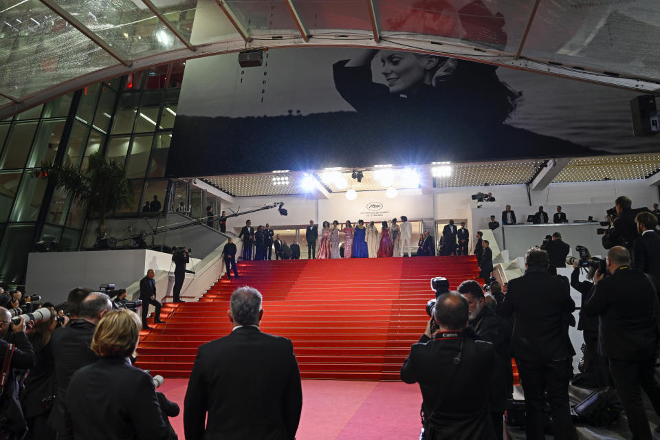 CANNES, FRANCE - MAY 19: (L-R) Majd Mastoura, Nour Karoui, Ichraq Matar, Hend Sabri, Director Kaouther Ben Hania, Olfa Hamrouni, Tayssir Chikhaoui, Eya Chikhaoui and Producer Nadim Cheikhrouha attend the "Les Filles D'Olfa (Four Daughters)" red carpet during the 76th annual Cannes film festival at Palais des Festivals on May 19, 2023 in Cannes, France. (Photo by Gareth Cattermole/Getty Images)