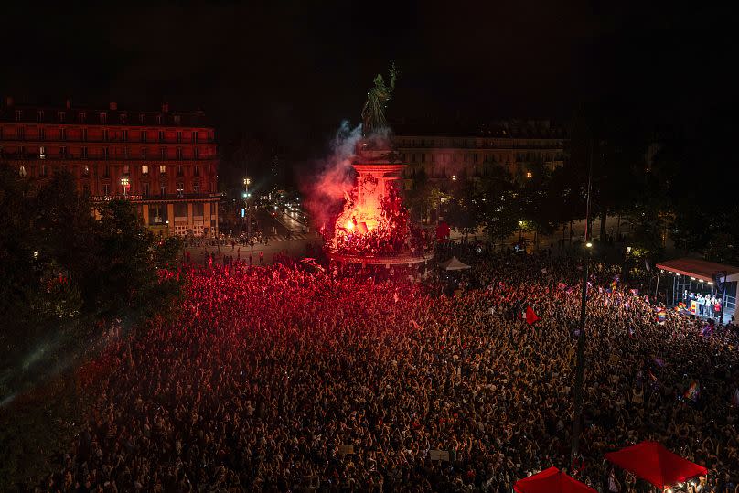 Protesters gather at Place de la République in Paris on Sunday after the first round of legislative elections.