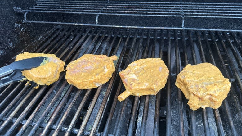 marinated pork chops on grill