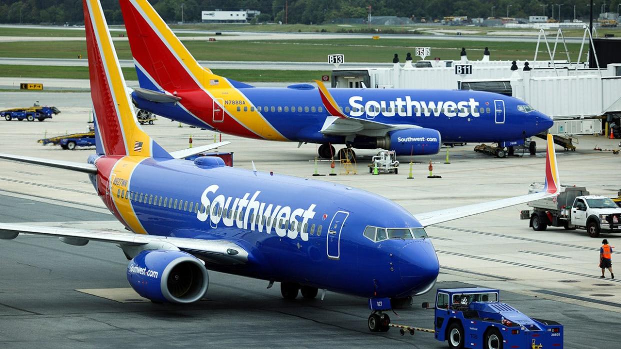 <div>A Southwest Airlines airplane taxies from a gate.</div> <strong>(Kevin Dietsch/Getty Images)</strong>