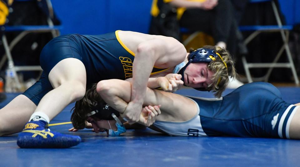 Spencerport's Cal Russo, top, wrestling Pittsford's Evan Smith earlier this season during the Section V Division I Dual Meet Wrestling Championships semifinal round at Victor High School.