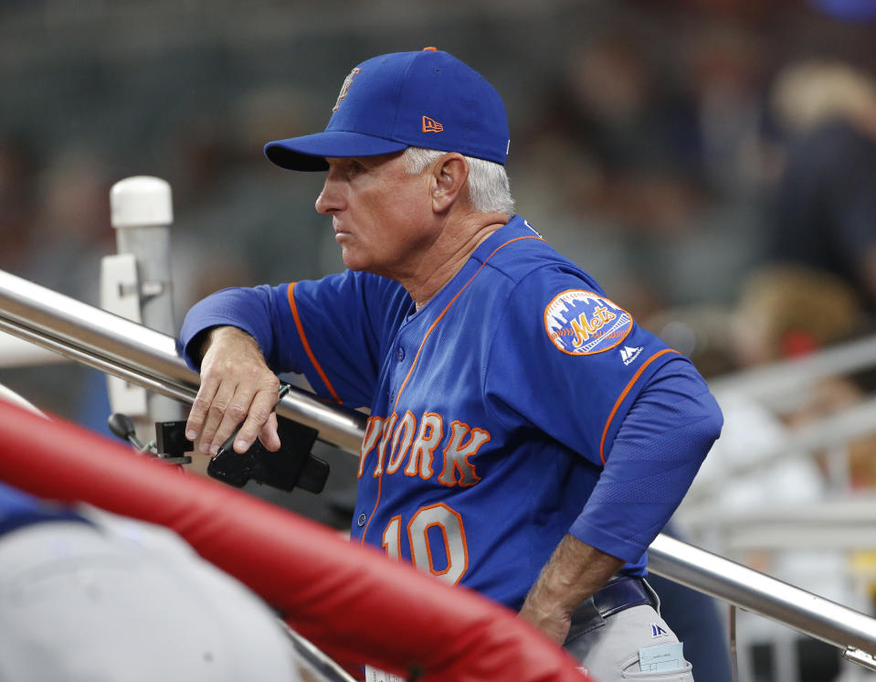 New York Mets manager Terry Collins (10) watches from the dugout during the team’s game against the Atlanta Braves on Friday, Sept. 15, 2017, in Atlanta. (AP Photo/John Bazemore)