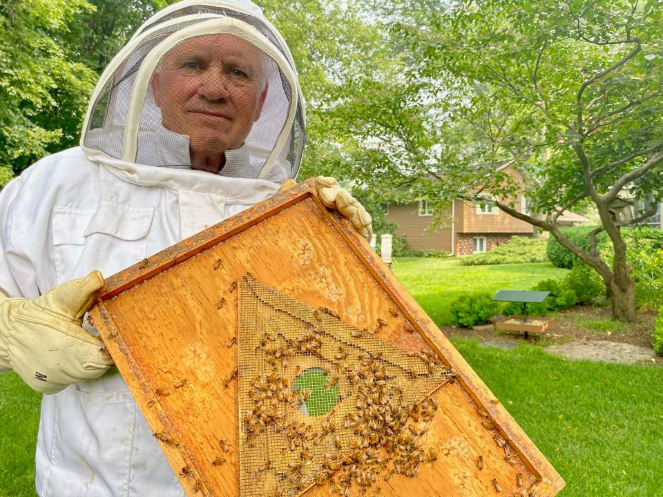 Former Rockford East High School football and wrestling coach Perry Giardini has kept bees in the backyard of his family home in Rockford for 40 years.