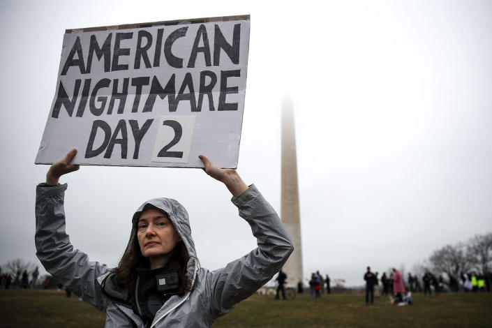 <p>A protestor, who identified herself as a ‘U.S. Citizen from Seattle’ holds up a sign near the Washington Monument during the Women’s March on Washington January 21, 2017 in Washington, DC. (Drew Angerer/Getty Images) </p>
