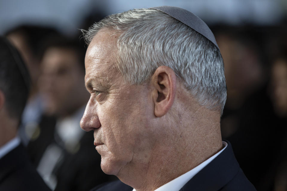 Blue and White Party leader Benny Gantz attends an official memorial for former Israeli Prime Minister Yitzhak Rabin and his wife Leah, commemorating 24 years since the assassination of Rabin, at Mt. Herzl in Jerusalem, Sunday, Nov. 10, 2019. (Heidi Levine/Pool via AP)