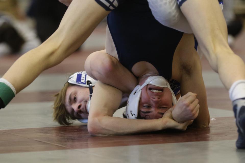 Shawn Redfield of Warren Hills and Justin Holly of Pope John in the 132 lb. finals at the Hunterdon/Warren/Sussex Wrestling Tournament in Phillipsburg, NJ on January 8, 2022.