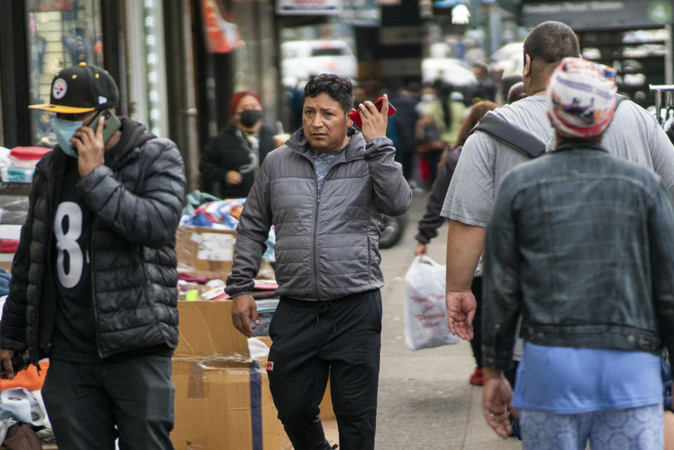 Ecuadorian immigrant Neptali Chiluisa walks around the borough of Bronx on Monday, Oct. 25, 2021, in New York. Chiluisa, who crossed the border in June in Arizona and was detained for a week with his 14-year-old son, acknowledges coming for economic reasons and wonders if he has any options for temporary legal status. (AP Photo/Eduardo Munoz Alvarez)