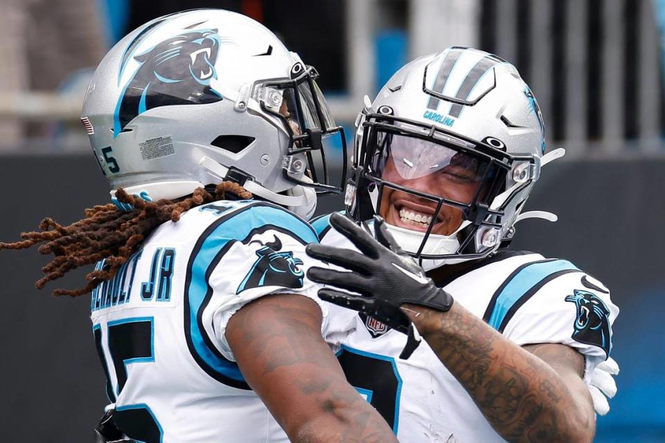 Carolina Panthers wide receiver Laviska Shenault Jr. (15) celebrates his touchdown with Carolina Panthers wide receiver DJ Moore (2) during a game against the New Orleans Saints at Bank of America Stadium in Charlotte, N.C., Sunday, Sept. 25, 2022.