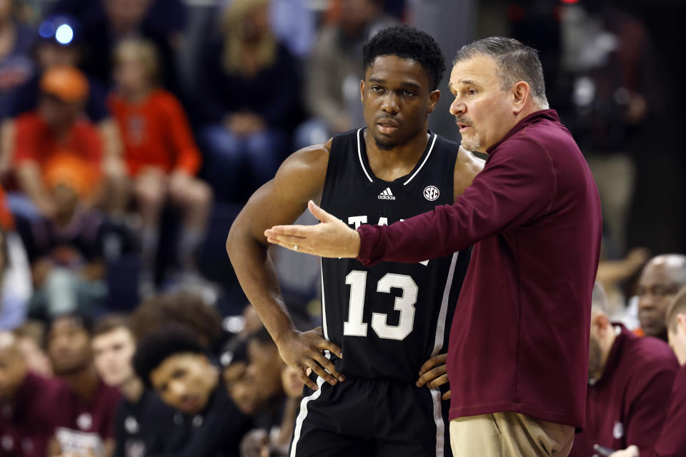 Mississippi State head coach Chris Jans talks with guard Josh Hubbard (13) during the first half of an NCAA college basketball game against Auburn, Saturday, March 2, 2024, in Auburn, Ala. (AP Photo/ Butch Dill)