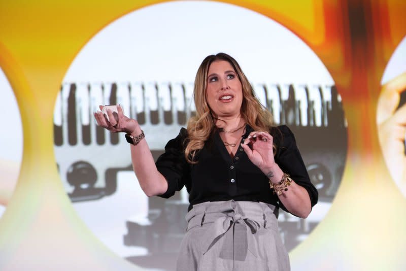 Michelle Esgar, Director of Marketing and Experience with Panasonic Consumer Electronics, holds an electric razor on stage during a press conference at the 2024 International CES at the Mandalay Bay Convention Center in Las Vegas on Monday. Photo by James Atoa/UPI