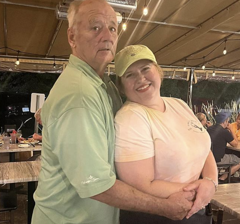 Bill Murray, left, poses with Kimberly McCarthy, right, at Turk's Seafood.