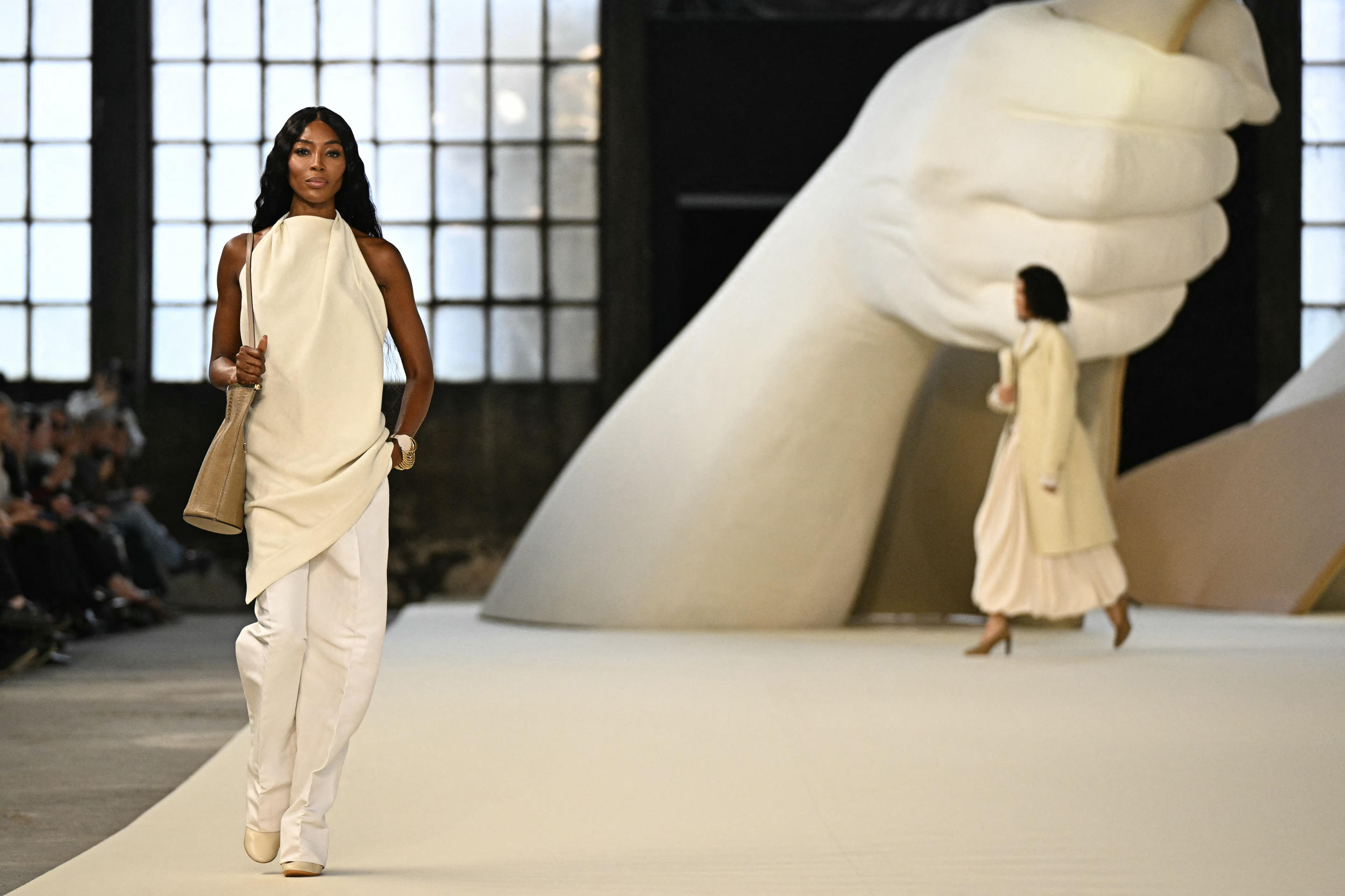 Celebrity model Naomi Campbell showcases an outfit from the Tod's collection. 