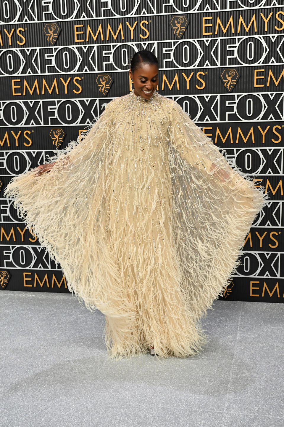 Issa Rae arrives at the 75th Emmy Awards.  / Credit: ROBYN BECK/AFP via Getty Images