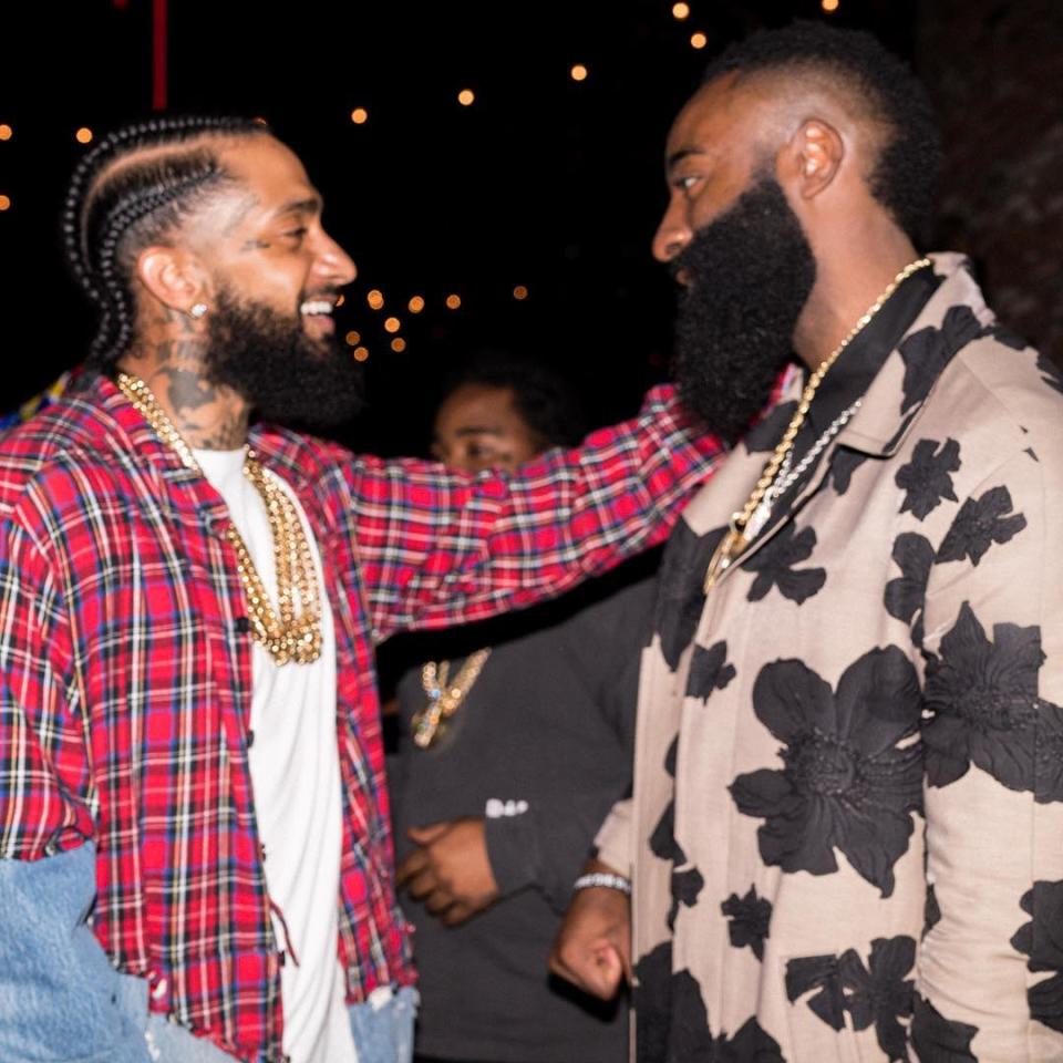<p>Nipsey Hussle‘s death has shaken the hip-hop community to its core and tributes are continuing to pour in from star’s closest friends. It’s been nearly three days since his senseless slaying and prominent A-listers are still reeling his untimely death. Stars like Ashanti, T.I., Ice Cube and Future took time to gather their thoughts before sharing […]</p> <p>The post <a rel="nofollow noopener" href="https://theblast.com/nipsey-hussle-celebrity-reactions-tributes/" target="_blank" data-ylk="slk:Nipsey Hussle Tributes Continue to Pour in from Celebrity Friends Following Death;elm:context_link;itc:0;sec:content-canvas" class="link ">Nipsey Hussle Tributes Continue to Pour in from Celebrity Friends Following Death</a> appeared first on <a rel="nofollow noopener" href="https://theblast.com" target="_blank" data-ylk="slk:The Blast;elm:context_link;itc:0;sec:content-canvas" class="link ">The Blast</a>.</p>