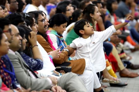 A boy reacts during the "Howdy Modi" event in Houston