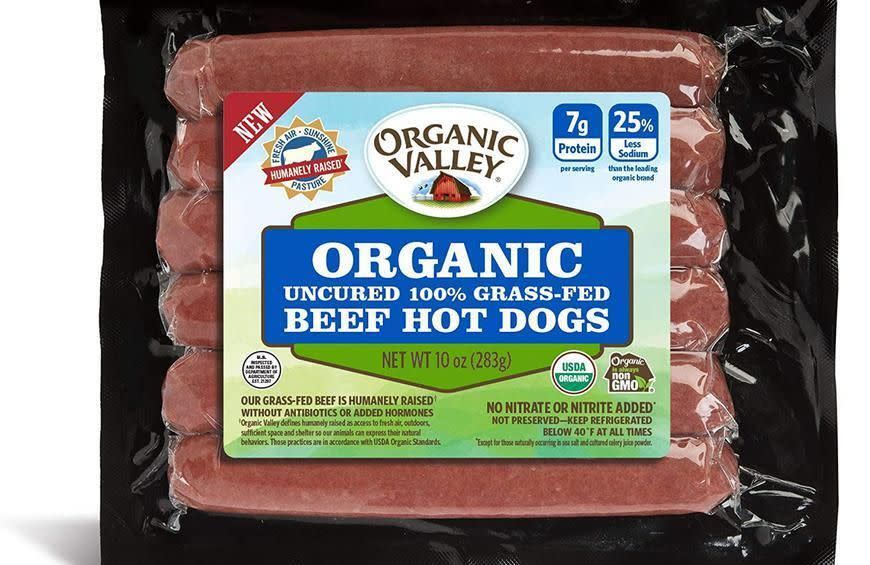 Package of Organic Valley Organic Uncured 100% Grass-Fed Beef Hot Dogs, 10 oz. The label notes high protein content and no antibiotics or added nitrates
