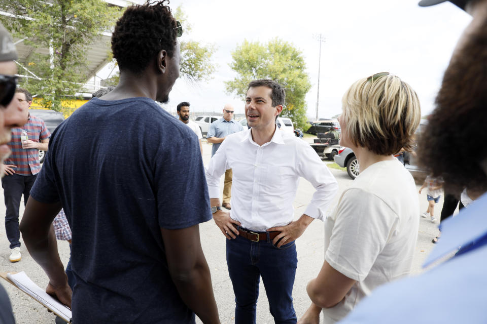 Democratic presidential candidate Pete Buttigieg talks with attendees at the Hawkeye Area Labor Council Labor Day Picnic, Monday, Sept. 2, 2019, in Cedar Rapids, Iowa. (AP Photo/Charlie Neibergall)