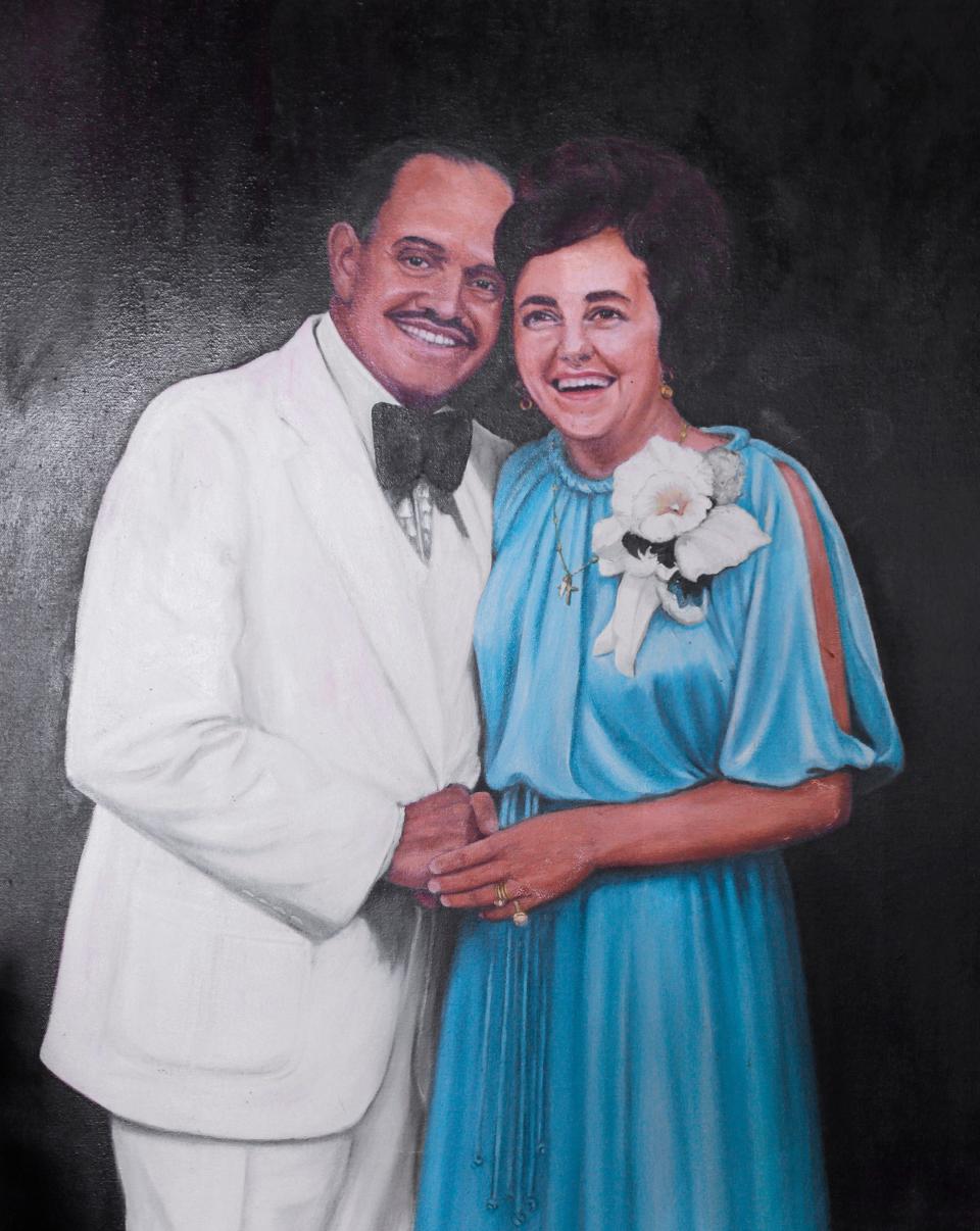 An oil painting of Maria and Tony Susi inside the entrance of The Berwick, photographed in September 2015.