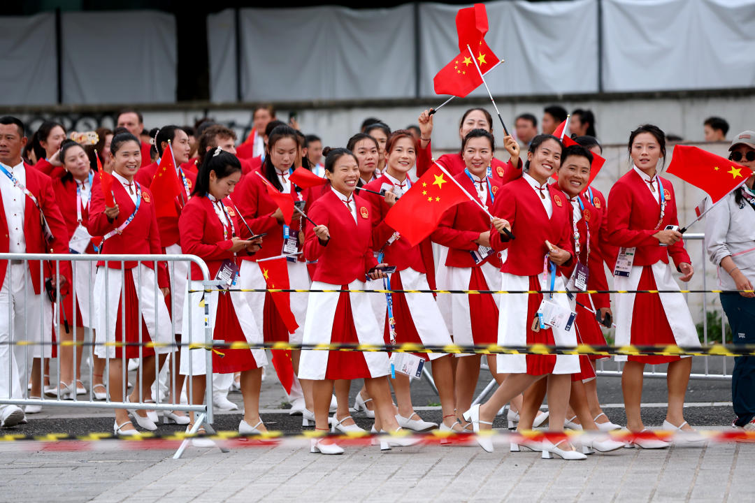 PARIS, FRANCE - JULY 26: Athletes of Team People's Republic of China are seen prior to the opening ceremony of the Olympic Games Paris 2024 on July 26, 2024 in Paris, France. (Photo by Hannah Peters/Getty Images)