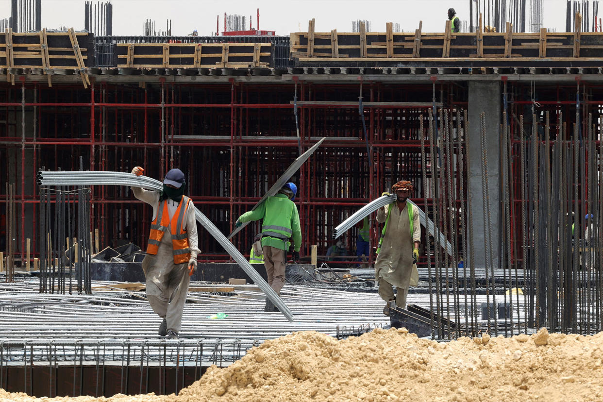 foreign migrant workers laborers Saudi Arabia FAYEZ NURELDINE/AFP via Getty Images
