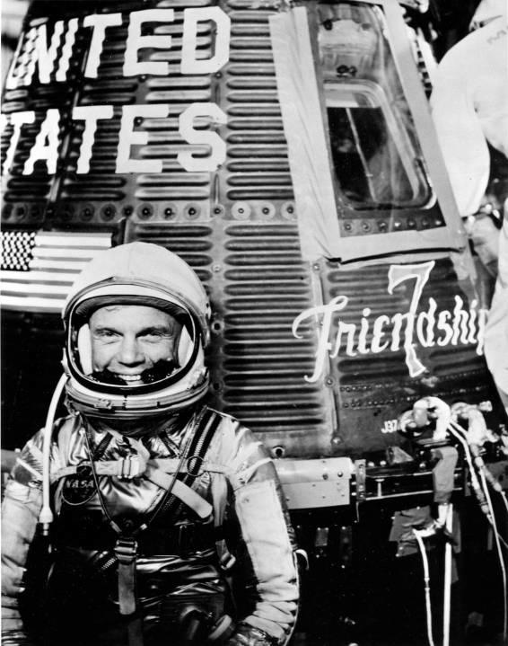 John Glenn and his “Friendship 7” Mercury capsule (NASA)