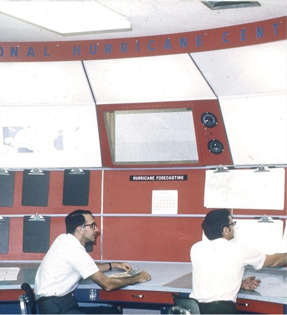 Pioneering hurricane expert Paul Hebert, left, with a colleague Robert Carson at the National Hurricane Center in Miami in 1972. Hebert, whose research of hurricane tracks uncovered trouble zones that would become known as “Hebert Boxes, died last month.