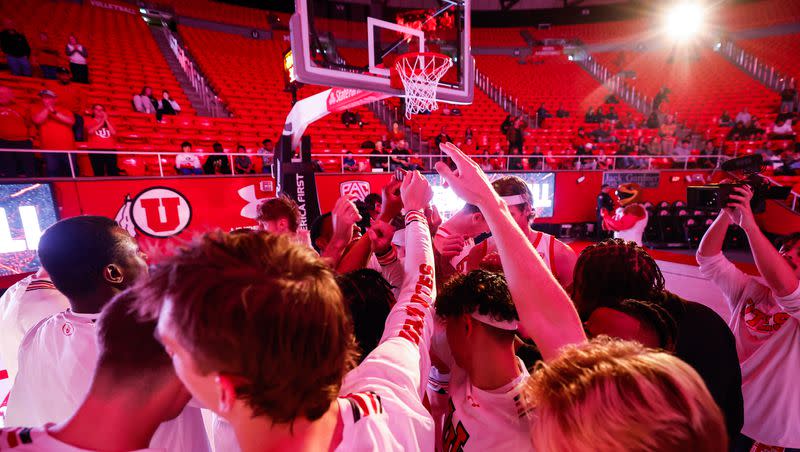 Members of the Utah Runnin’ Utes huddle together before an exhibition game against Westminster at the Huntsman Center in Salt Lake City on Wednesday, Nov. 01, 2023.