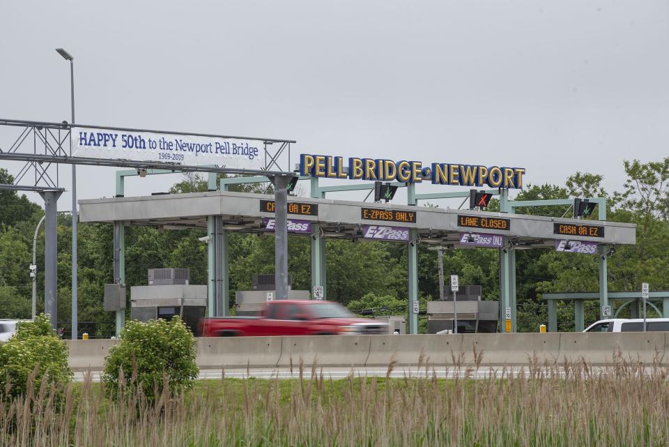 A truck drives through the Newport Pell Bridge toll plaza.